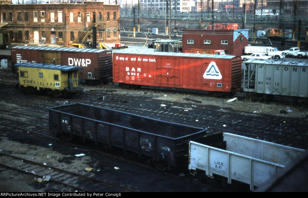 LIRR W 43 & W 47 both gondoloas - LIRR Yellow & Blue Caboose w/ damaged end